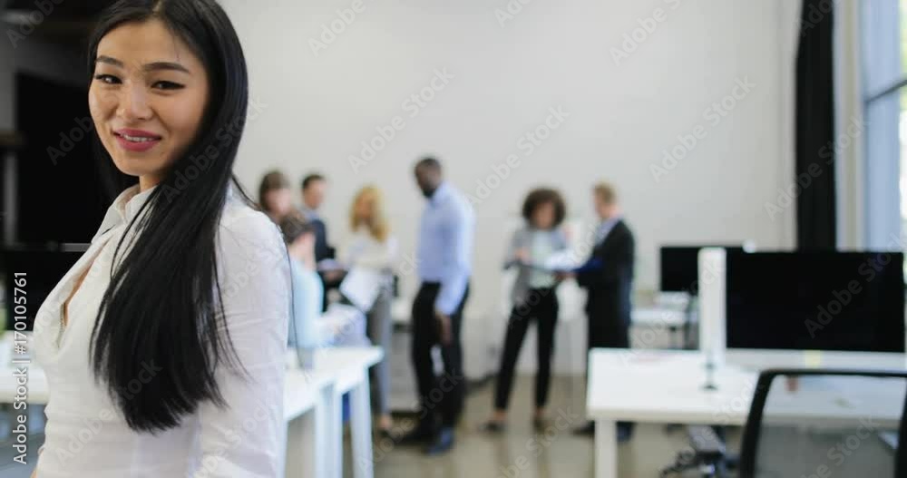 Asian Businesswoman Walk In Modern Office Use Cell Smart Phone While Business People Team Busy Working Together On Background Slow Motion 60 Asian Businesswoman Walk In Modern Office Use Cell Smart Phone While Business People Team Busy Working Together On Background Slow Motion 60