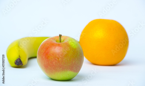 Apple and banana on a white background