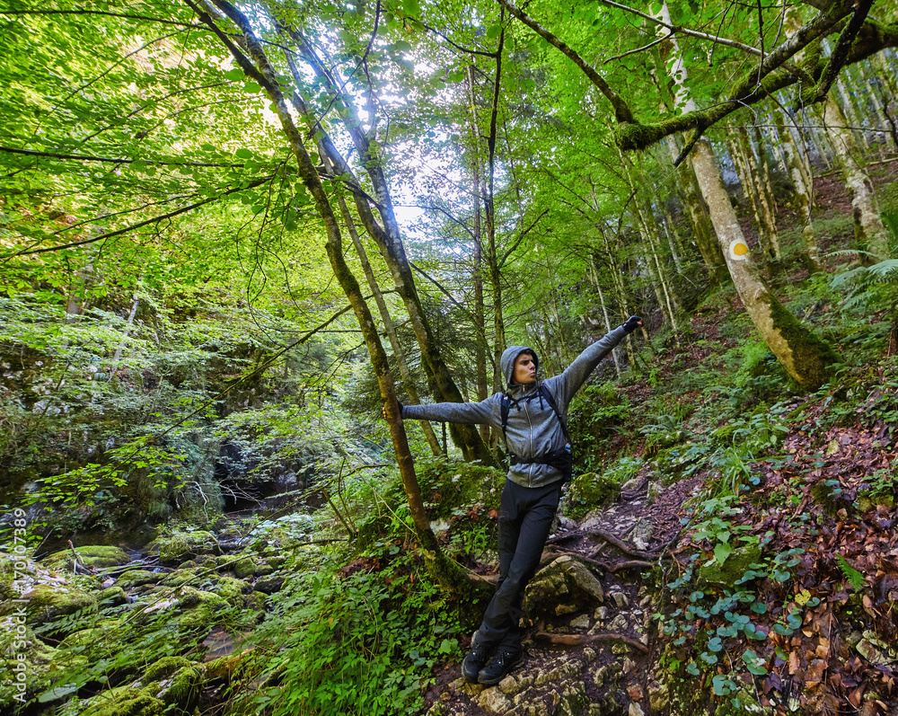Teenager hiker on a trail Teenager hiker on a trail