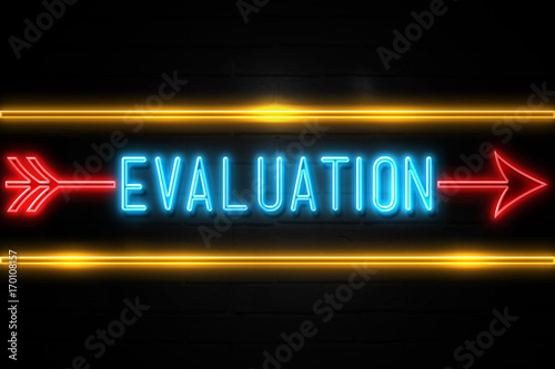 Evaluation  - fluorescent Neon Sign on brickwall Front view