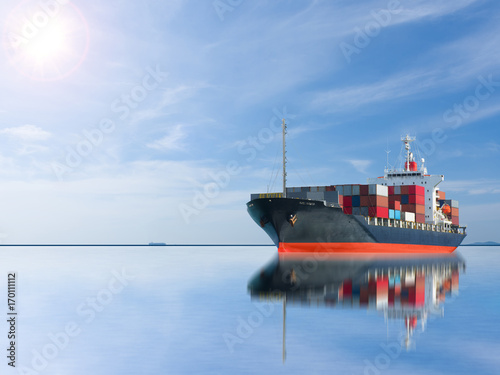 Fototapeta Naklejka Na Ścianę i Meble -  ship with container vessel go to international terminal port with throughput Capacity import export goods Far Eastern Freight Conferenceto client concept worker team of business.