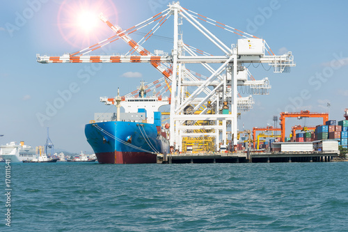ship with container vessel go to international terminal port with throughput Capacity import export goods Far Eastern Freight Conferenceto client concept worker team of business.