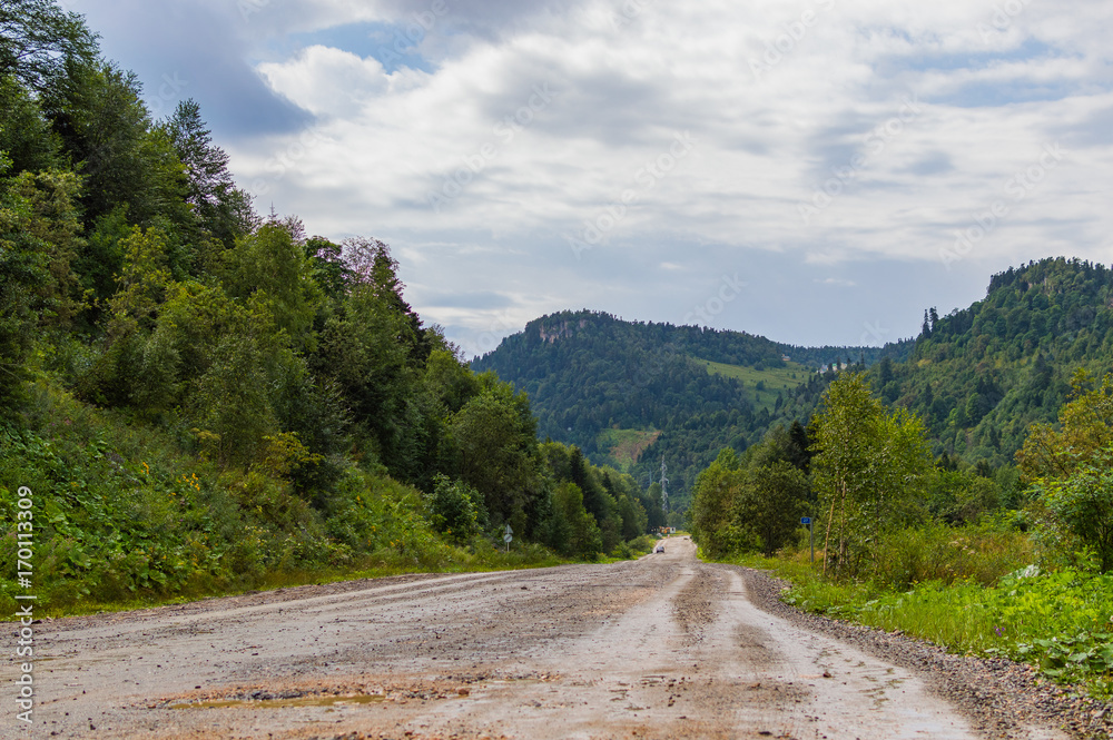 Dirt road in the mountains of Adygea republic, Krasnodar region, Russia