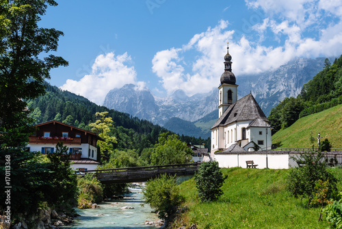 Scenic view of small church against mountains