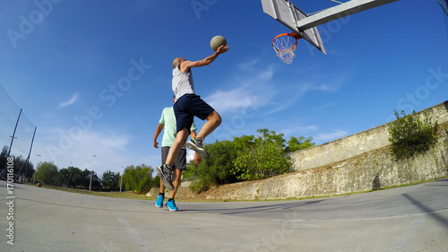 Lay up shot on a basketball playground