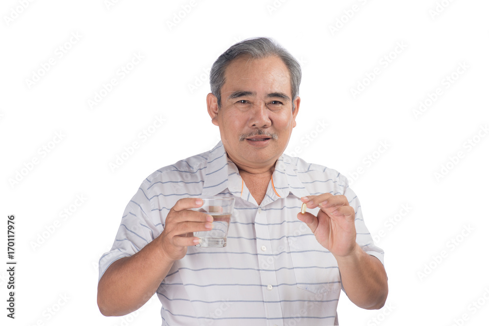 Asian senior man holding omega-3 capsule isolated on white Asian senior man holding omega-3 capsule isolated on white