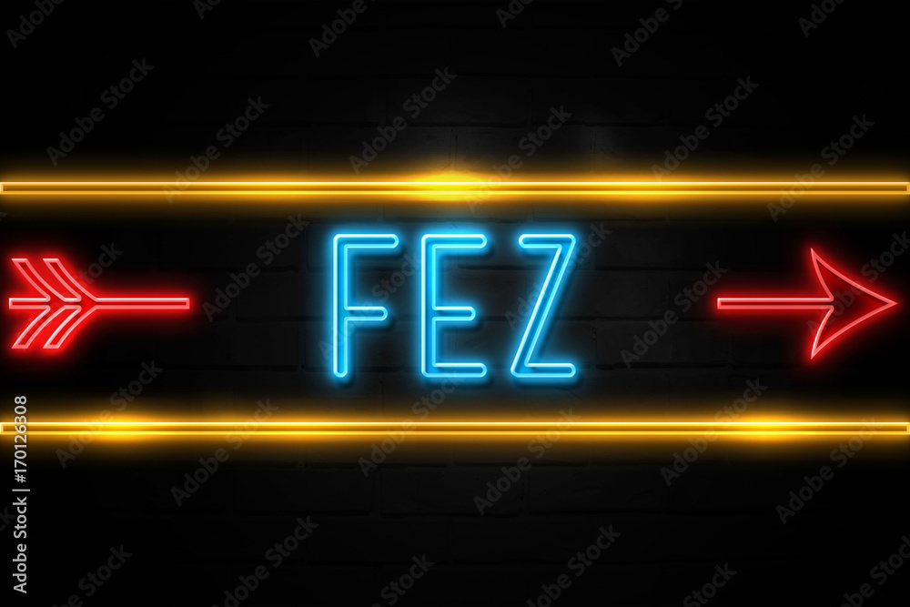Fez - fluorescent Neon Sign on brickwall Front view Fez - fluorescent Neon Sign on brickwall Front view