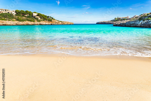 Stunning beach bay with beautiful turquoise sea water scenery on Majorca island  Spain