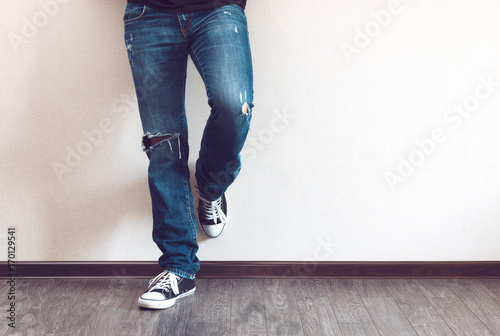 Man's legs in jeans