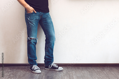 Man's legs in jeans