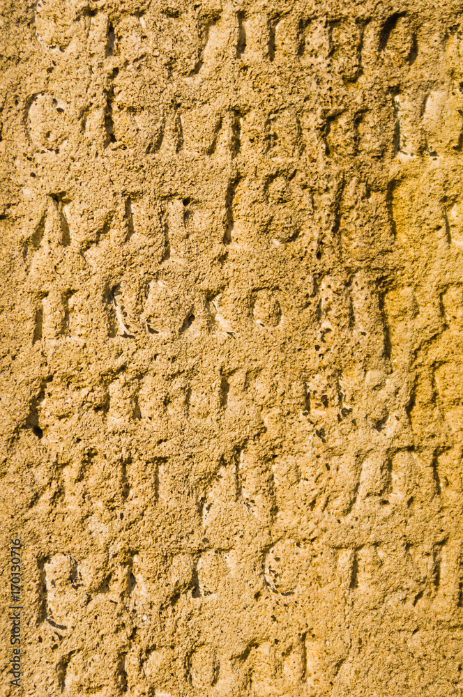 Ancient cyrilic script in a stone, at old Belgrade fortress, Serbia