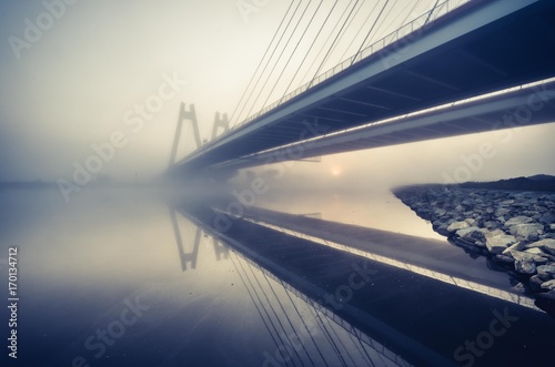 cable-stayed-bridge-krakow-poland-in-the-morning-fog-over-vistula-river