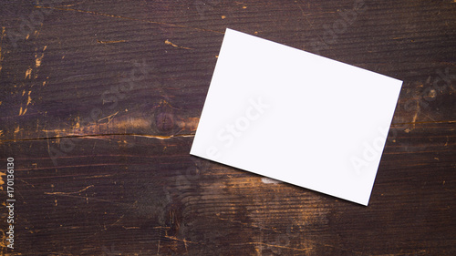 Wallpaper Mural a white blank postcard template for graphic design on a wooden background Torontodigital.ca