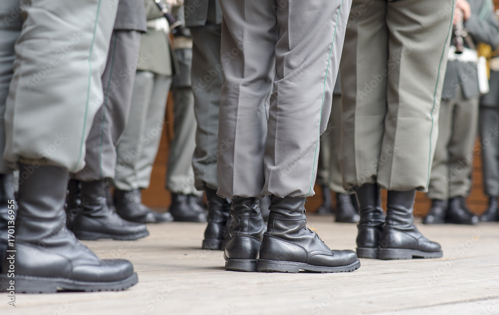 Row of soldiers legs dressed in special Austrian military shoes Row of soldiers legs dressed in special Austrian military shoes