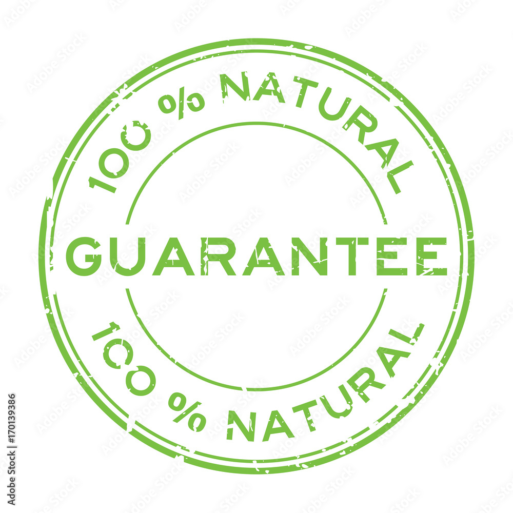 Grunge green 100 percent natural guarantee round rubber seal stamp on white background