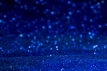 blue glitter texture christmas abstract background. Abstract blue lights on background. bokeh blue background.