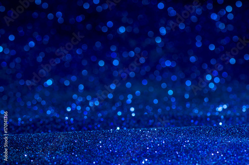 blue glitter texture christmas abstract background. Abstract blue lights on background. bokeh blue background.
