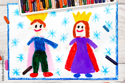 Photo of colorful drawing: smiling king and queen with their crowns