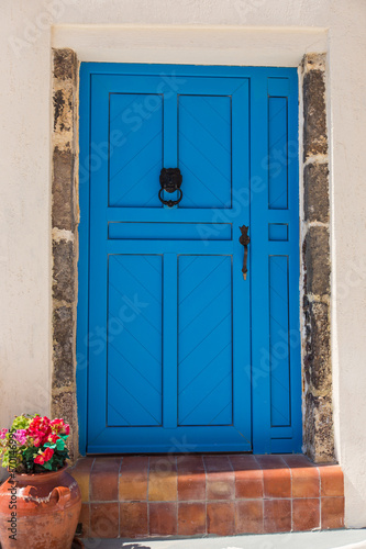 Old blue doors in Greece, Santorini island, Oia village.