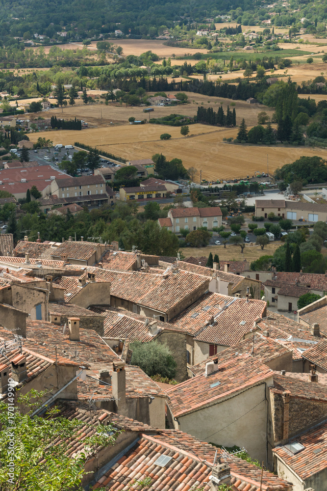 The picturesque view on the tile roofs of the houses of Fayence village in Cote d’Azur, Provence, France