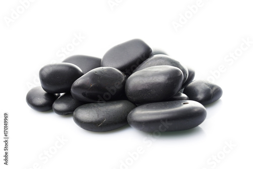 Massage stones on white. Black Stones isolated