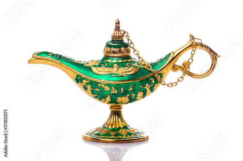 Vintage lamp of Aladdin. Old style oil lamp. Ancient lamp. Genie lamp also called Aladdin lamp with pharaonic symbols photo