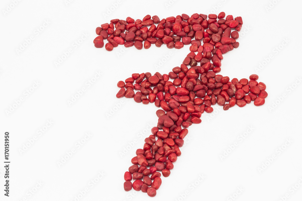 The number seven, made by red stones. The number seven, made by red stones.