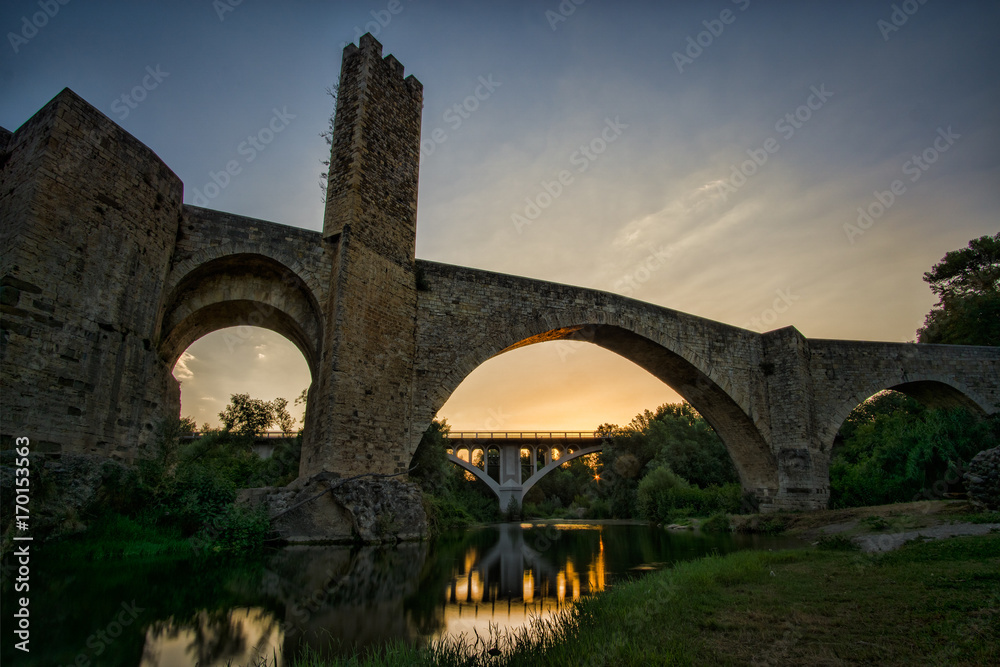 Besalu Bridge/Sunrise from the river Fluvia under the Besalu Bridge (Catalonia)