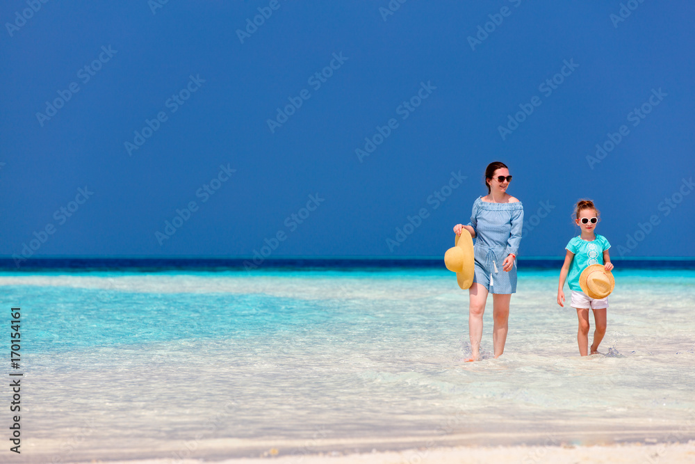 Mother and daughter at beach