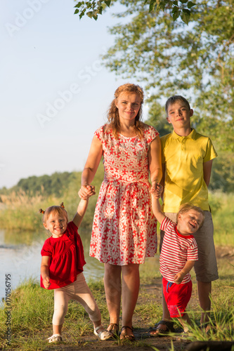 Mom with children twins © Evgenia Tiplyashina
