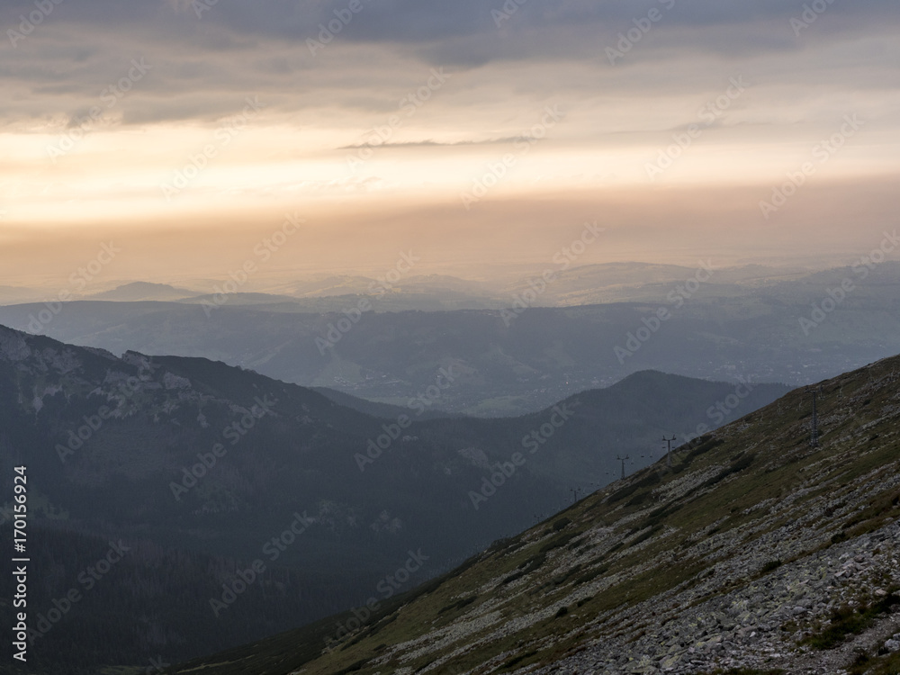 View of the valley from the mountain at sunset