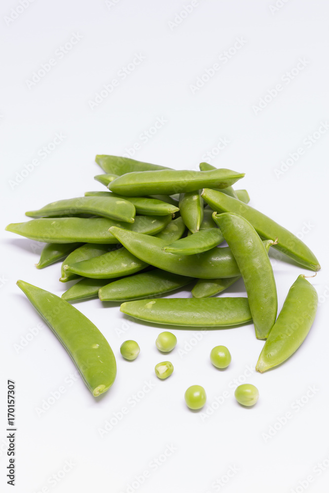 Green sugar snap peas isolated on white background. Green sugar snap peas isolated on white background.