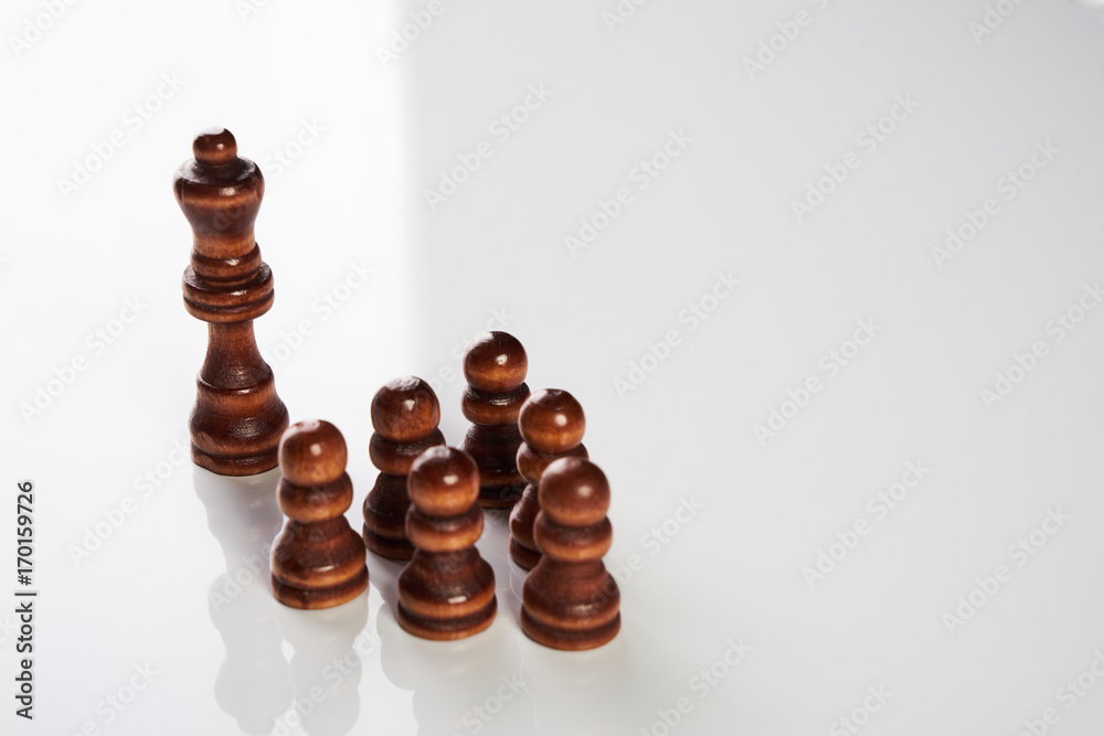 Chess leadership concept with wooden brown chess Chess leadership concept with wooden brown chess