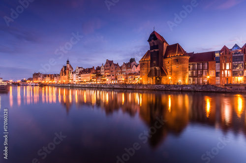 Gdansk old town with harbor and medieval crane in the evening