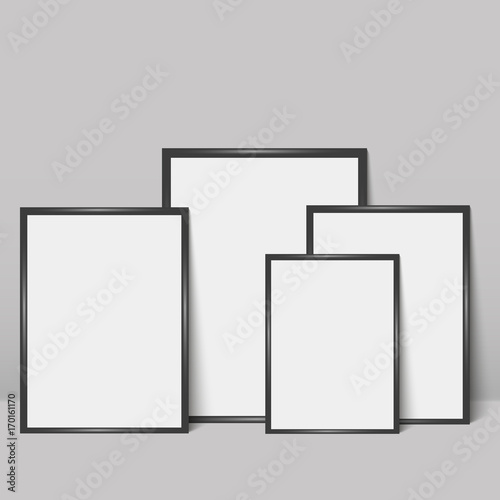 Black photo frame leaning against a grey wall. Vector illustration. Mock up