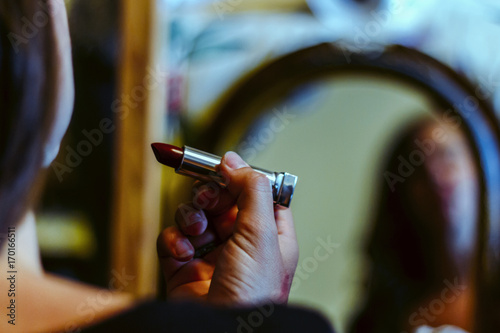  Mystery lady applies Lipstick 