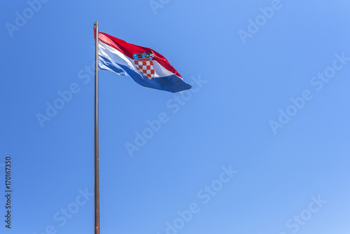 Flag of Croatia flying on a sunny day.