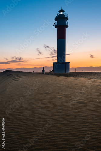 Sunset at "Far del Fangar". Lighthouse at Tarragona, Spain.