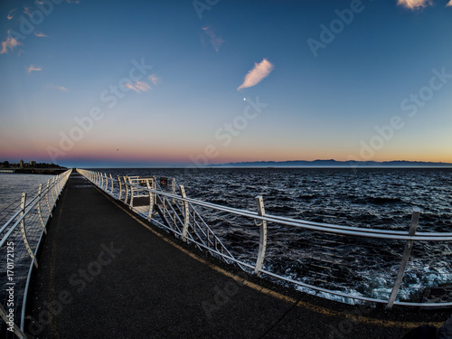 Breakwater at the Ogden Point in Victoria, BC, Canada; sunset time