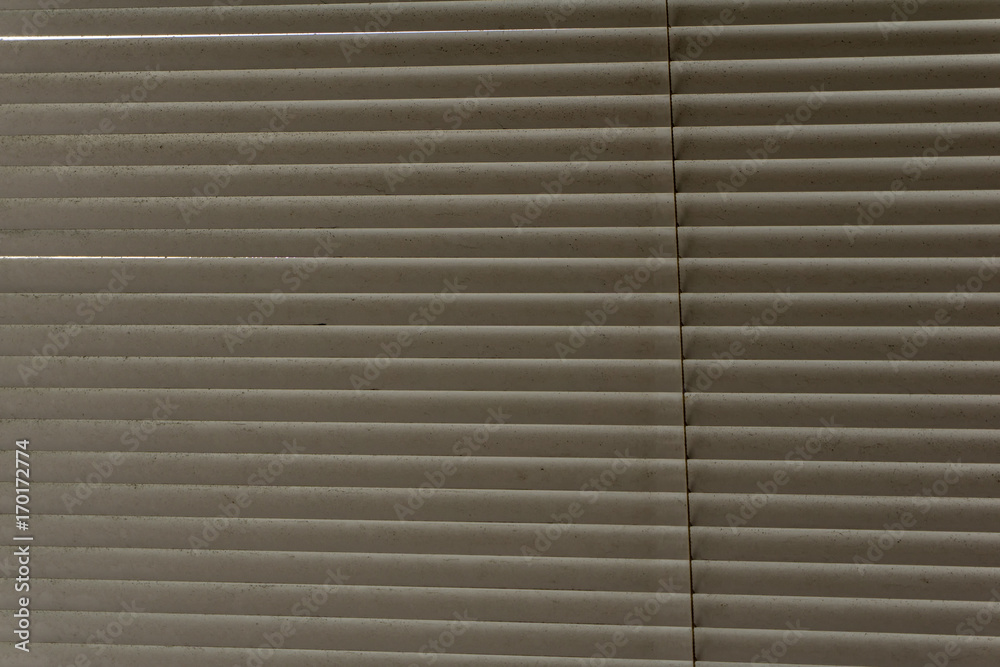 Das Muster eines Rollladens als Textur oder Hintergrund Das Muster eines Rollladens als Textur oder Hintergrund