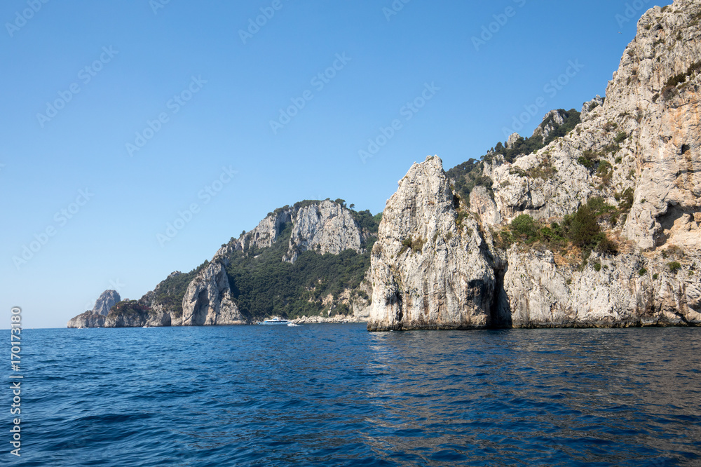 View from the boat on the cliff coast of Capri Island