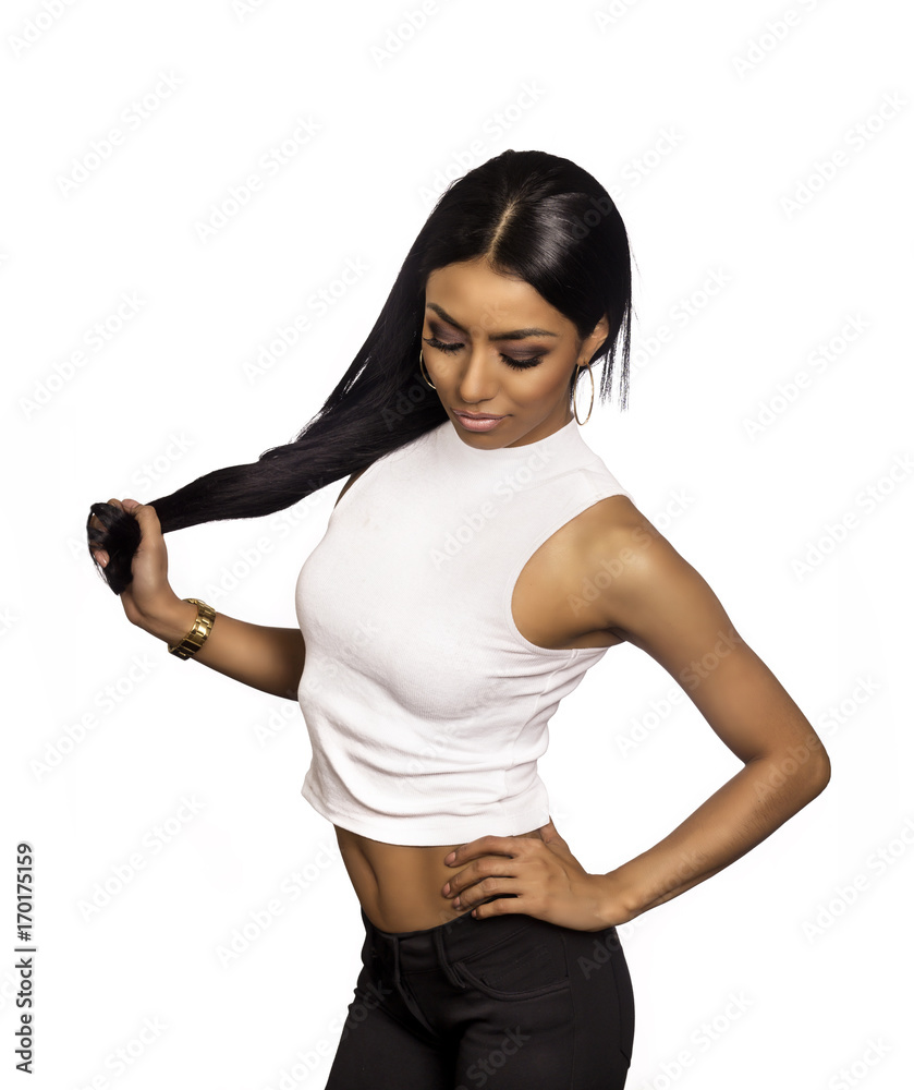 Beautiful woman holding her long dark hair Beautiful woman holding her long dark hair