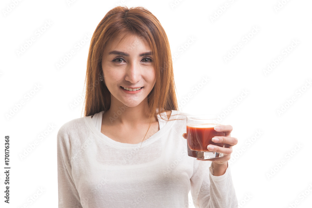 Young Asian woman drink tomato juice. Young Asian woman drink tomato juice.