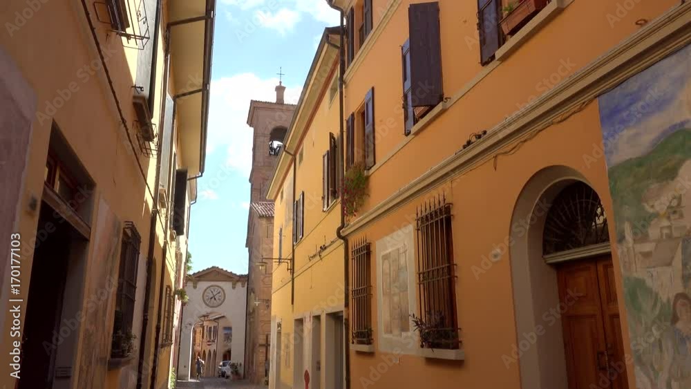 cinematic shot of colorful street of the medieval village of Dozza, a small gem among the architectural wonders of Italy cinematic shot of colorful street of the medieval village of Dozza, a small gem among the architectural wonders of Italy