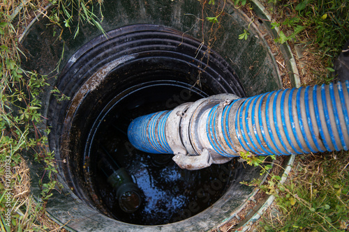 Photography Emptying household septic tank