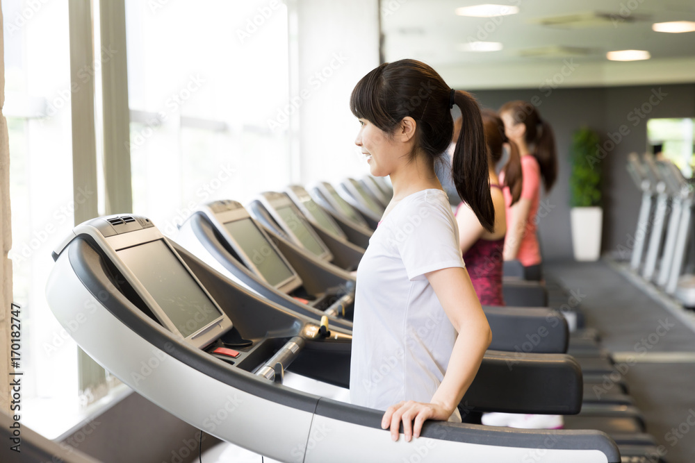 sporty asian women exercising in sports gym