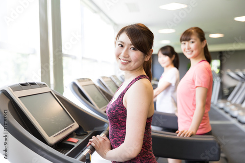 sporty asian women exercising in sports gym