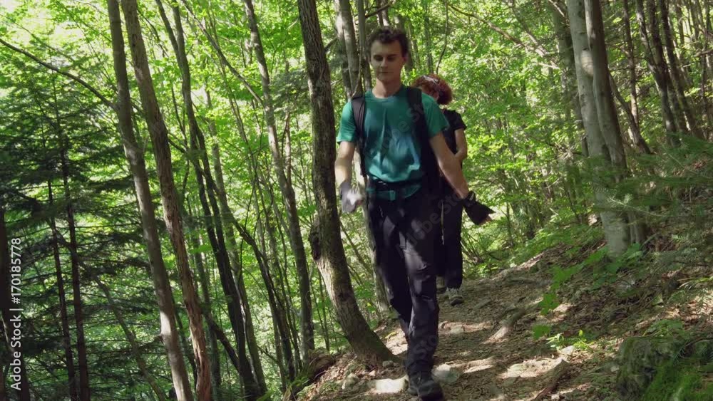 People hiking with backpacks People hiking with backpacks