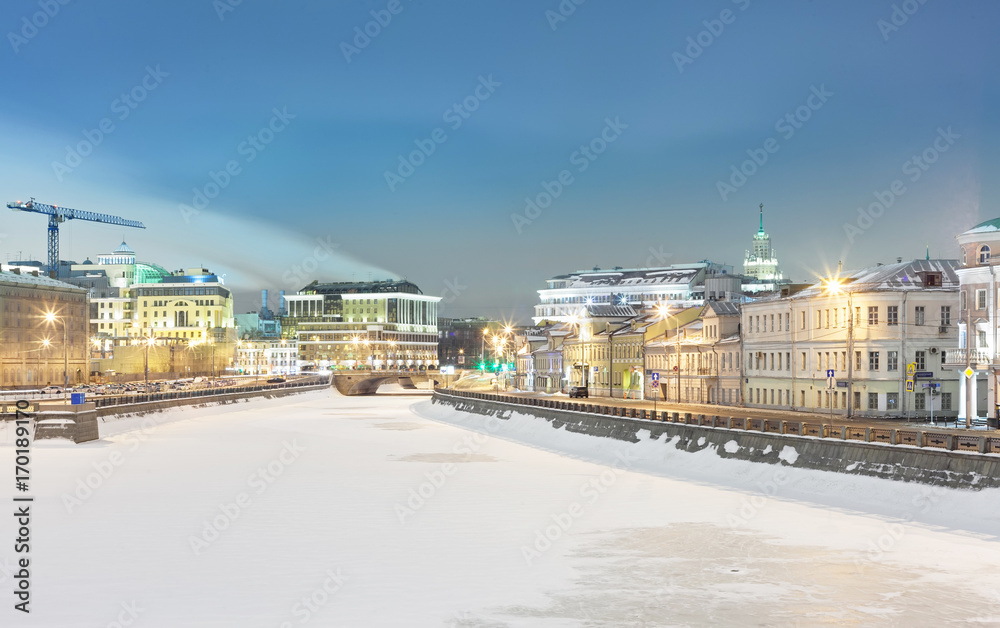 Frozen and covered with snow, the Moskva River
