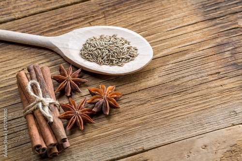 spices on a wooden background © Alexandr Vlassyuk